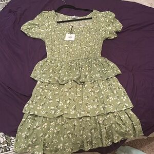 A Charlotte Russe  green dress with flowers on it